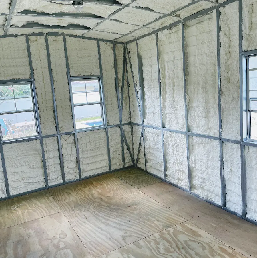 Closed-cell spray foam insulation applied to wall cavities in a residential project in Fond du Lac